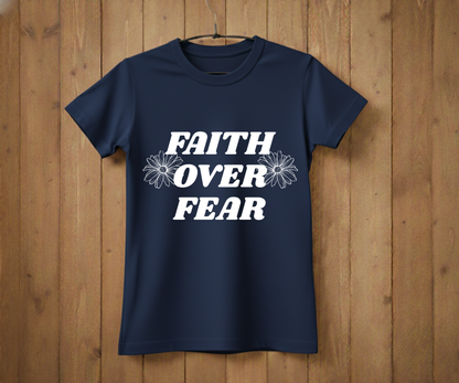 Navy blue t-shirt with 'Faith Over Fear' text on a wooden background