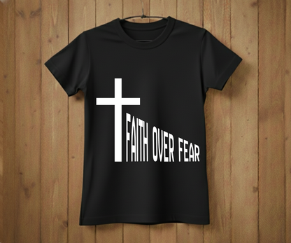 Black t-shirt with a white cross and 'Faith Over Fear' text on a wooden background